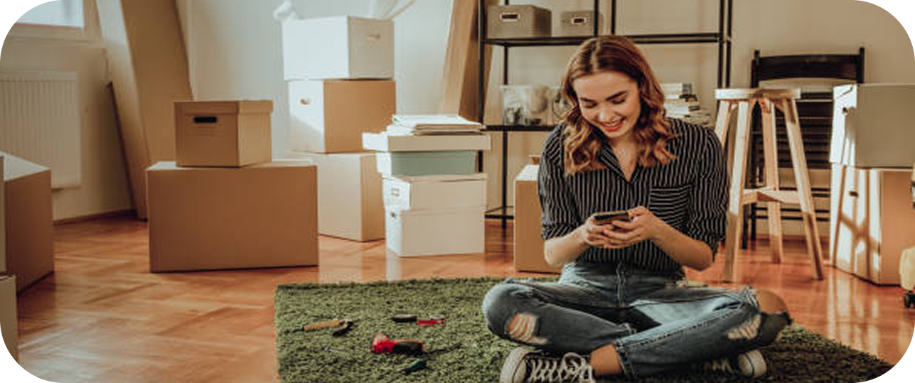 Image of a woman sitting on the floor